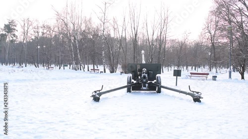 Rear view of the military gun in the winter Park.