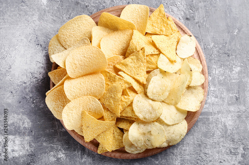 Potato chips on cutting board