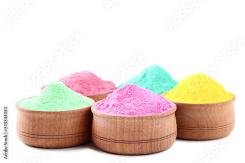 Colorful holi powder in bowls on white background © 5second