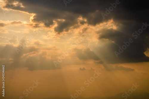 The light of God to be pierced the curtain of smoke There is light coming out the cloud.Light through the clouds