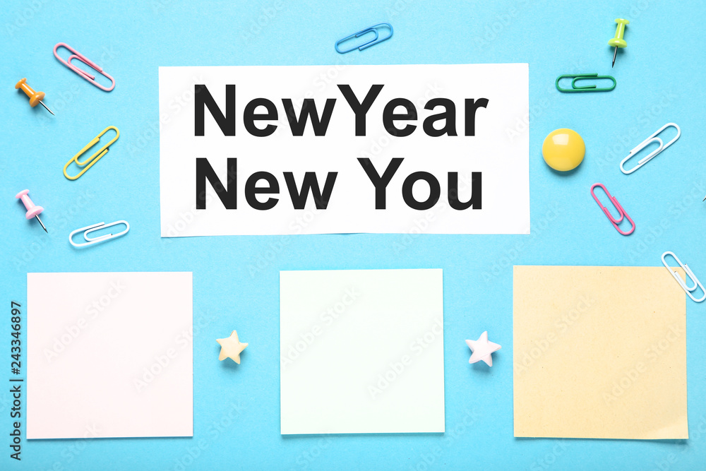 New year new you on sheet of paper with colorful clips New year new you on sheet of paper with colorful clips