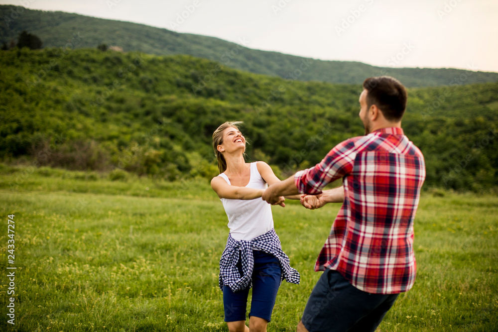 Loving coulpe having fun in the spring nature Loving coulpe having fun in the spring nature