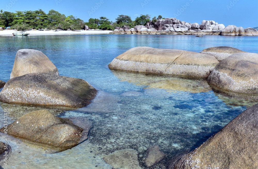 Fototapeta premium Tanjung Tinggi Beach which is rich for its granites with their various sizes, Belitung Island, Indonesia