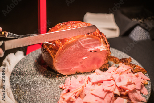 Delicious ham being sliced