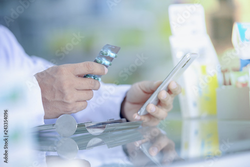 Pharmacy drugstore retail Interior blur background with healthcare product on medicine cabinet.Pharmacy interior with blurred background.Defocused image of medicines arranged in shelves at pharmacy.