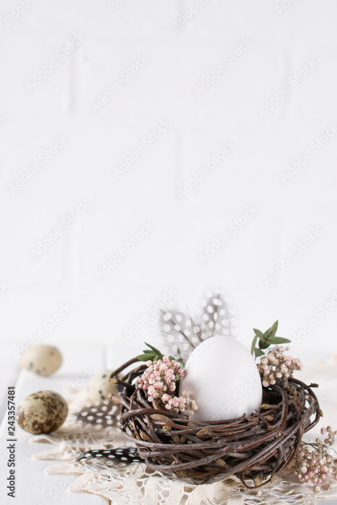 Easter eggs decoration. Nest with white chicken egg. Happy Easter or spring greeting card Easter eggs decoration. Nest with white chicken egg. Happy Easter or spring greeting card