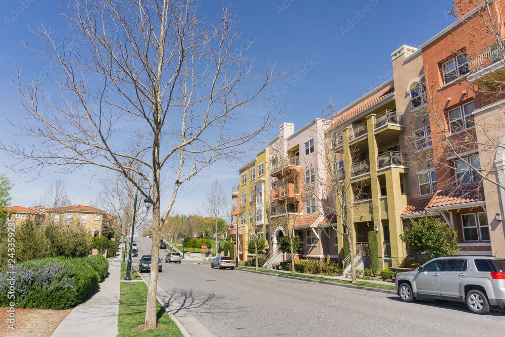 Street on telecommunication hill, residential multifamily buildings on the side of the road; San Jose, California