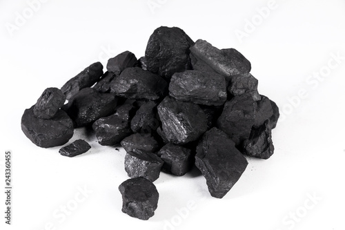 Tableau sur toile pile black coal isolated on white background