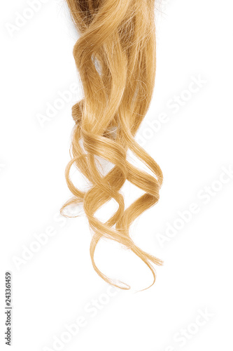 Natural wavy blond hair on white background