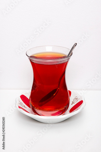 One cup of tea over white background.