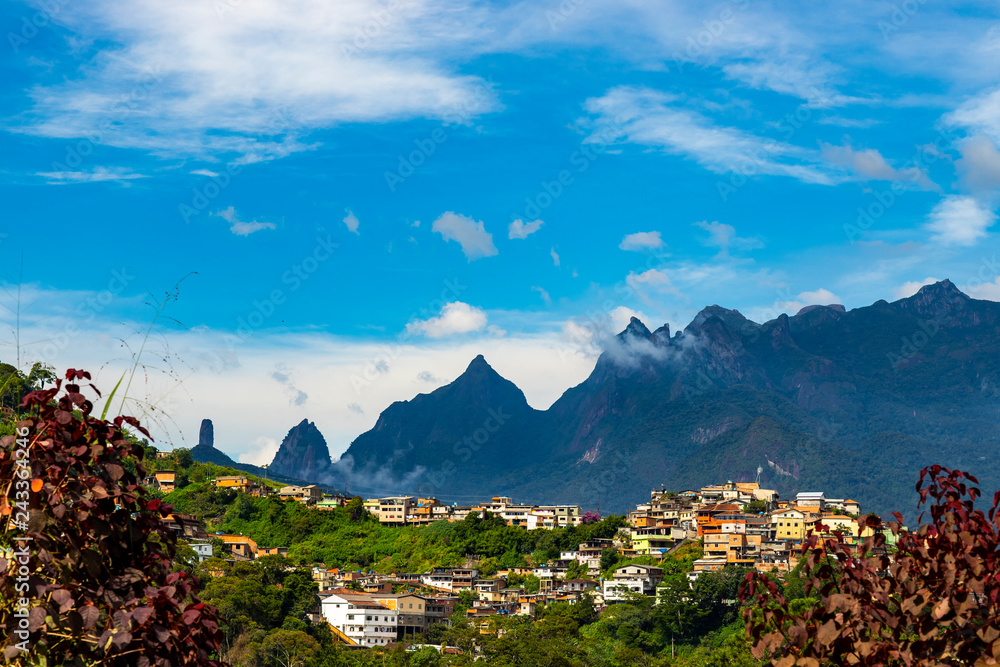 Small town on the hill and the mountain in the background. City of Teresópolis, district of Jardim Meudon, state of Rio de Janeiro Brazil, South America. 