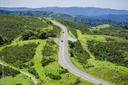 Cars driving on Skyline Boulevard on a spring day, San Francisco bay area, California
