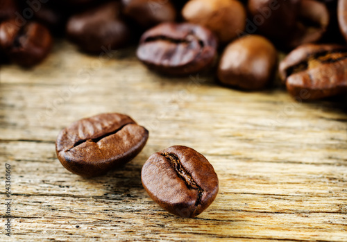 Coffee beans on a dark wood background