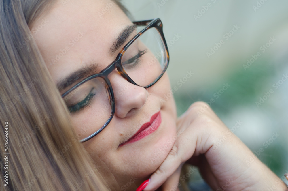Close up portrait young girl face blonde with glasses and red lips Close up portrait young girl face blonde with glasses and red lips
