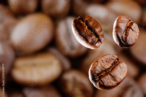 Coffee beans on a dark wood background