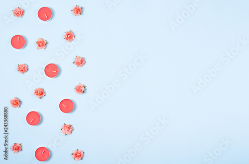 Flat lay arrangement of candles and flowers for mock up design, table top view image of decoration valentine's day background