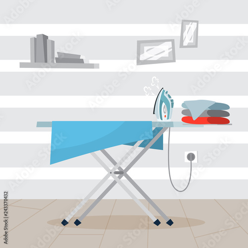 Iron and pile of clothes on ironing board.