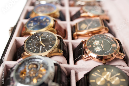 storage box with collection of men wrist watches