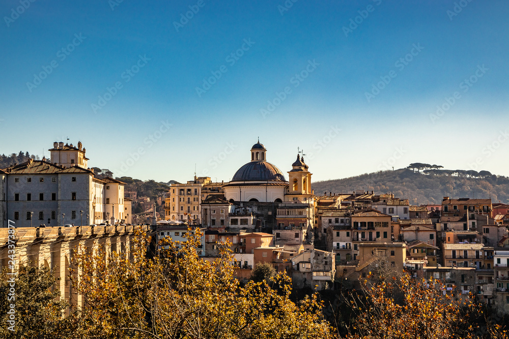 View of Ariccia, with the monumental bridge, the baroque Chigi palace and the church of Santa Maria Assunta by Gian Lorenzo Bernini. Castelli Romani, Lazio, Italy.