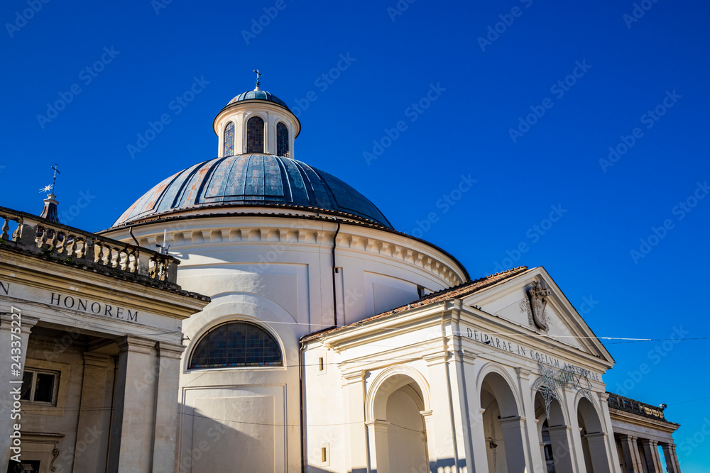 the church of Santa Maria Assunta, in the monumental Piazza di Corte, by Gian Lorenzo Bernini and the Chigi family. The dome, the bell tower and the fountain. Ariccia, Castelli Romani, Lazio, Italy.
