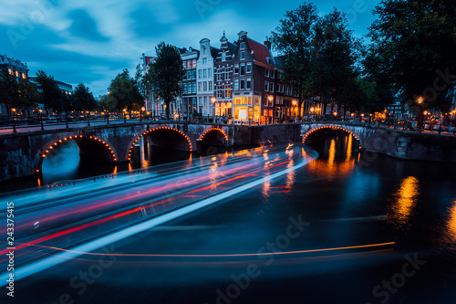 Photography Famous Amsterdam Canal and magic light trails of a Vessel