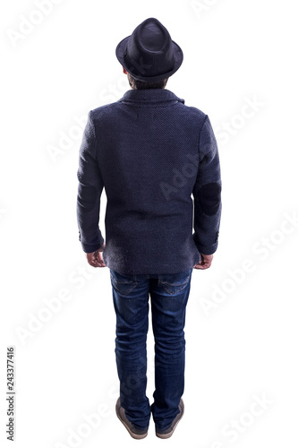man with hat and jacket stands with his back to the viewer, isolated on white background