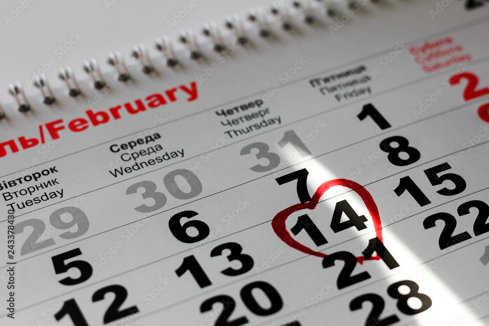 Calendar with the date of  February 14 Valentine's day with red heart mark