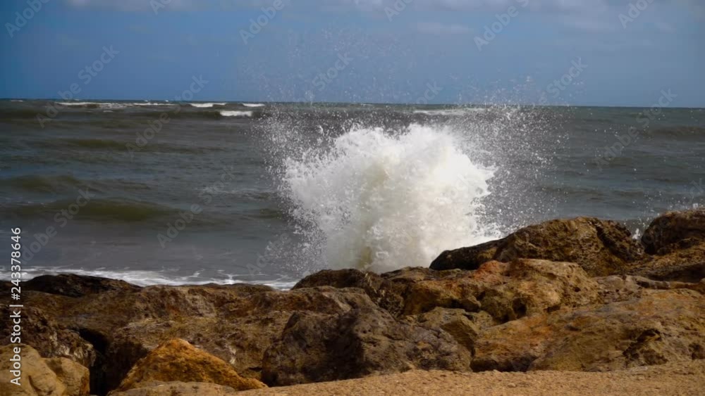 The waves of the storm sea hit the rocks and fly around with a lot of splashes. Slow mo, slo mo, slow motion, high speed camera, 240fps, 250fps The waves of the storm sea hit the rocks and fly around with a lot of splashes. Slow mo, slo mo, slow motion, high speed camera, 240fps, 250fps
