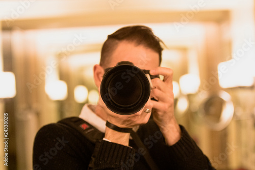 man photographs himself in mirror © Chris Reynolds