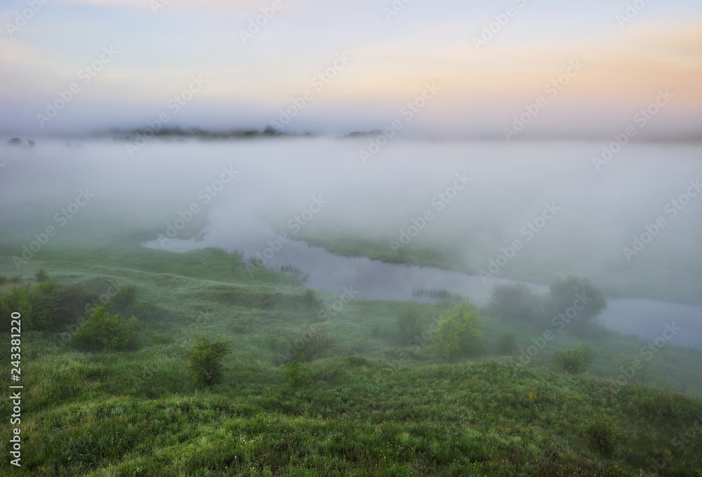 spring morning valley of the picturesque river. spring fog