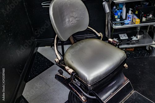 empty chair in tattoo shop