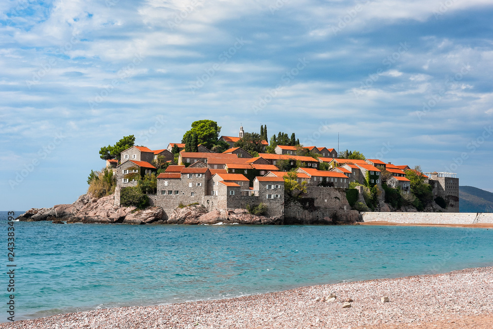 Island Sveti Stefan at Montenegro, old town beach view