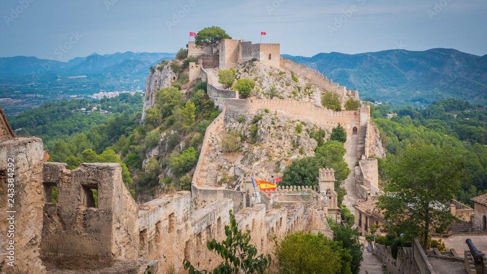 View of bigger Jativa / Xativa medieval castle from the smaller castle in Valencia region on the Mediterranean coast in Spain. Moorish, Romans, and Christians castle built by King James I of Aragon.