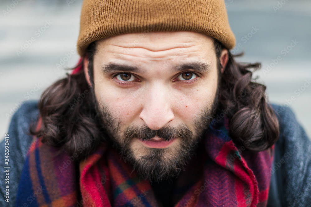 Man with beard and mustache fall and winter season. Hipster cool, sexy, handsome young guy. Real people concept. Male urban trendy hat, scarf and coat. Man with beard and mustache fall and winter season. Hipster cool, sexy, handsome young guy. Real people concept. Male urban trendy hat, scarf and coat.