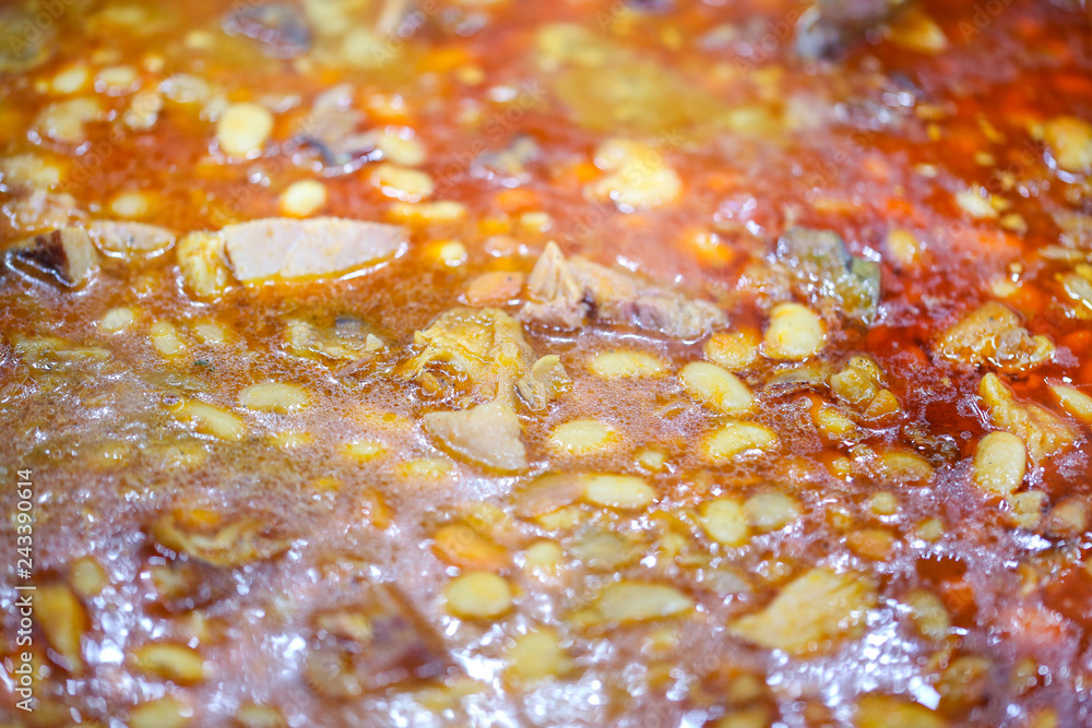 Bean soup with smoked (pork) hocks at the Christmas Market in Timisoara, Romania Bean soup with smoked (pork) hocks at the Christmas Market in Timisoara, Romania