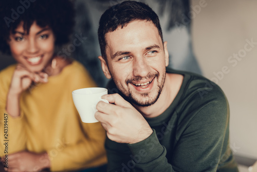 Man and woman sitting together in cafe