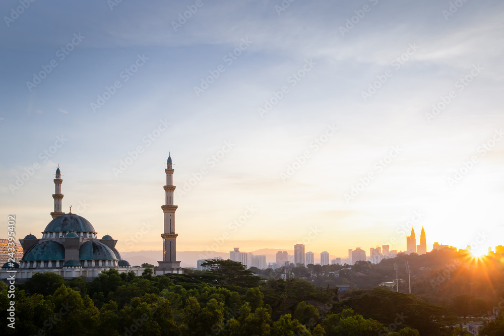 Federal Mosque view during the sunrise with Kuala Lumpur Cityscape