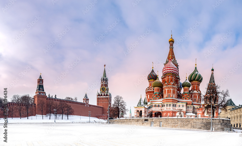 Fototapeta premium Moscow. Russia. The Red Square. Kremlin. Spasskaya Tower. Panorama of Moscow. Travel to Russia. Hours on Red Square. St Basil's Church. Center of Russia. Kremlin walls. Moscow in winter