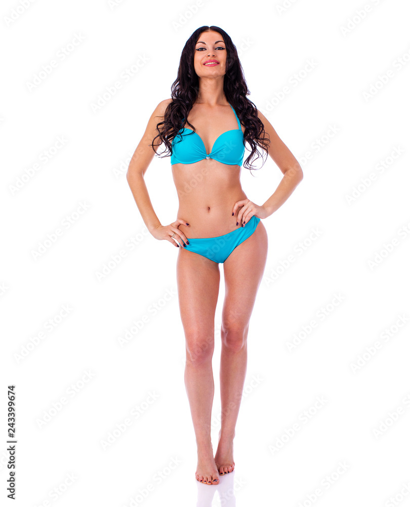 Portrait of young brunette woman wearing turquoise bikini Portrait of young brunette woman wearing turquoise bikini