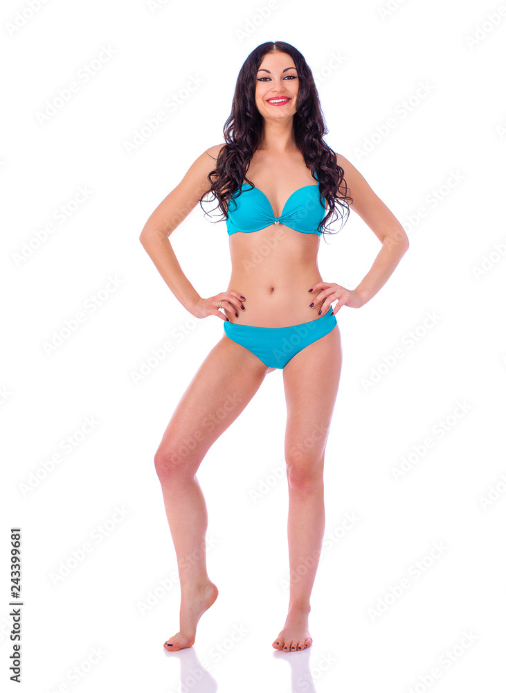 Portrait of young brunette woman wearing turquoise bikini Portrait of young brunette woman wearing turquoise bikini