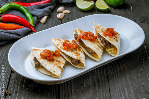 Quesadilla with beef and sauces