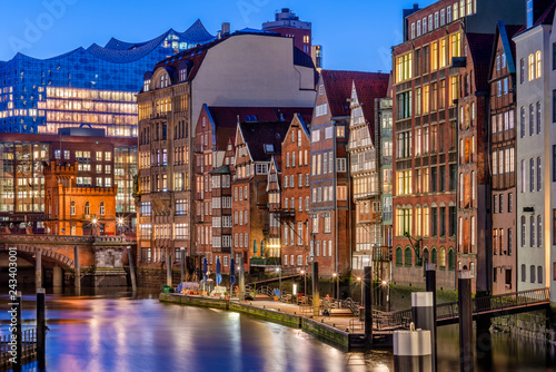 The Nikolaifleet in Hamburg, Germany, at dusk. It is a canal in the old town (Altstadt) and is considered one of the oldest parts of the Port of Hamburg. photo