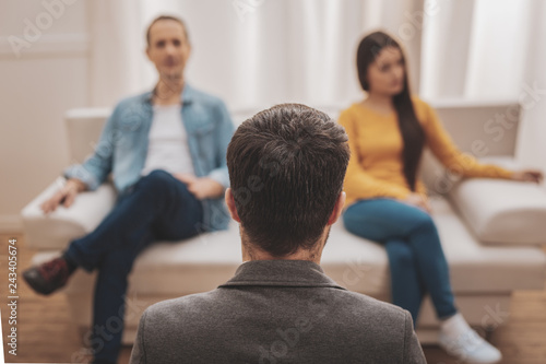 Relationships expert talking to two disillusioned personalities
