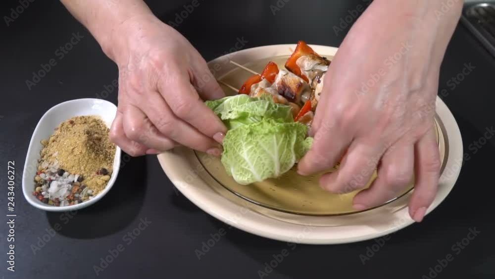 Server plate with chicken kebab. Slow motion Server plate with chicken kebab. Slow motion