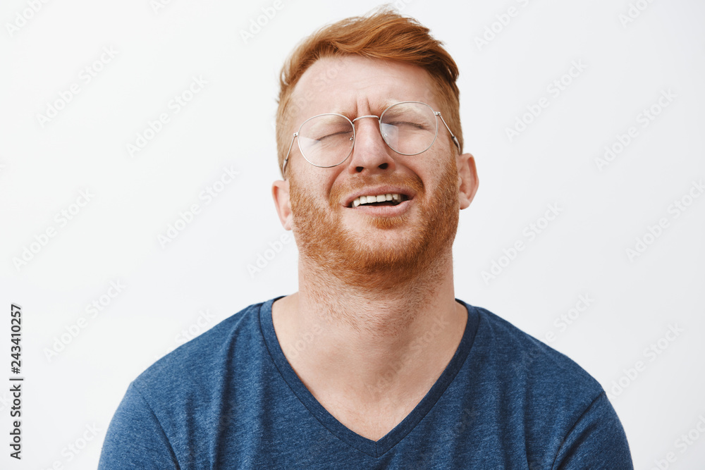 Ταπετσαρία Indoor shot of gloomy and upset redhead mature man with beard, tilting head behi