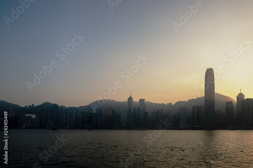 Silhouette of Hong Kong Victoria Harbour. During sunset; vintage style