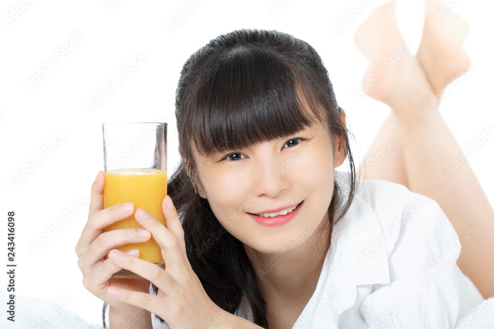 Chinese woman drinking orange juice isolated on white background Chinese woman drinking orange juice isolated on white background