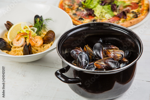 Shellfish Mussels in copper bowl photo