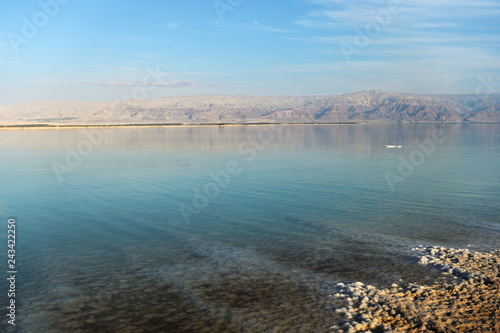 Coast of the Dead Sea lit by the evening sun