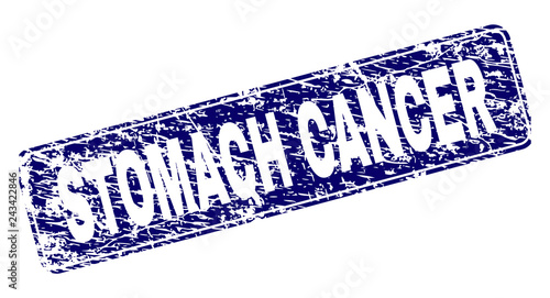 STOMACH CANCER stamp seal print with distress style. Seal shape is a rounded rectangle with frame. Blue vector rubber print of STOMACH CANCER text with dirty style.
